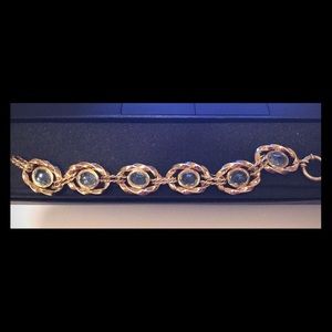 “Gold Bracelet w/light Blue Topaz Stones”